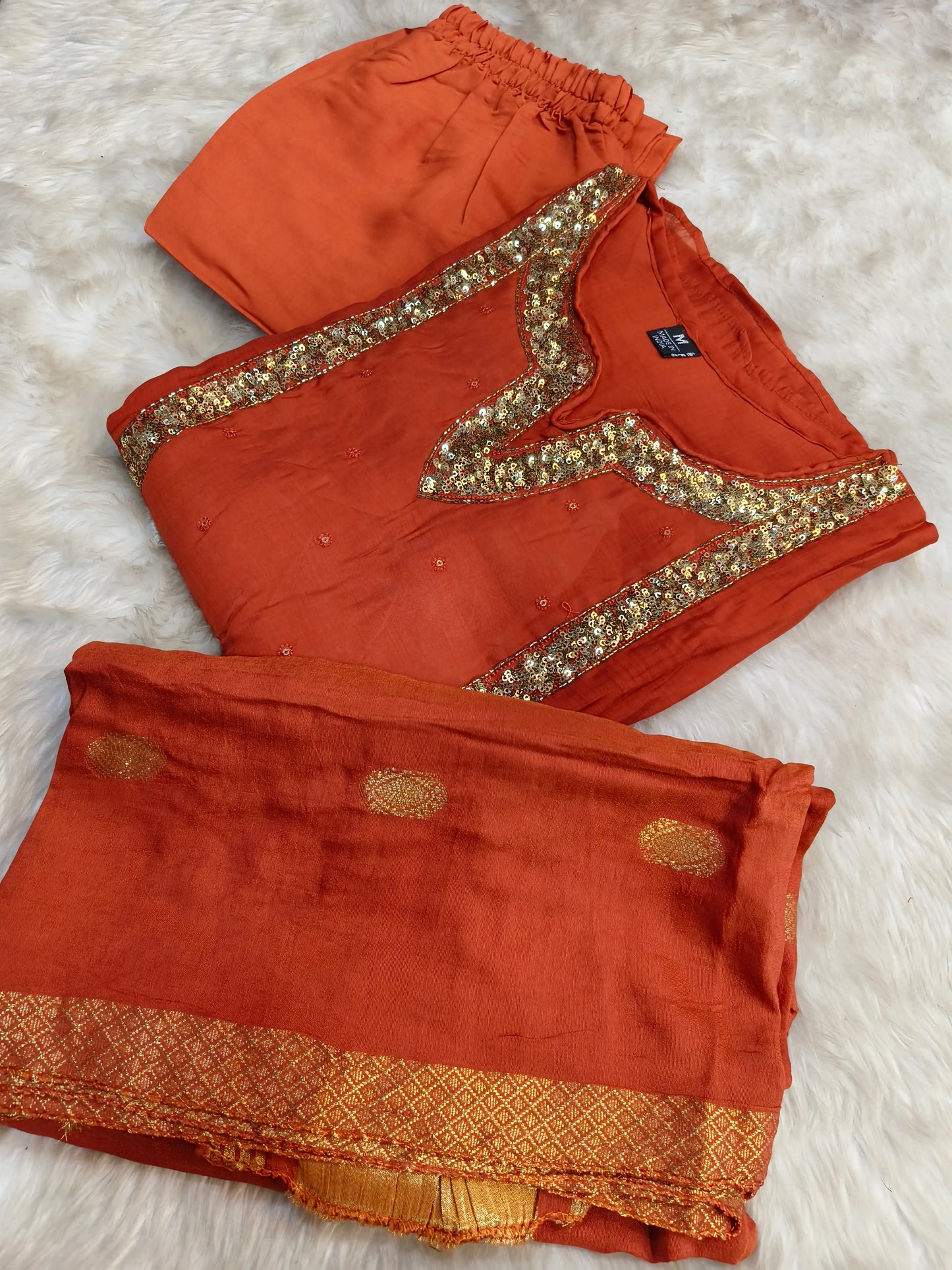 Orange designer Aline suit