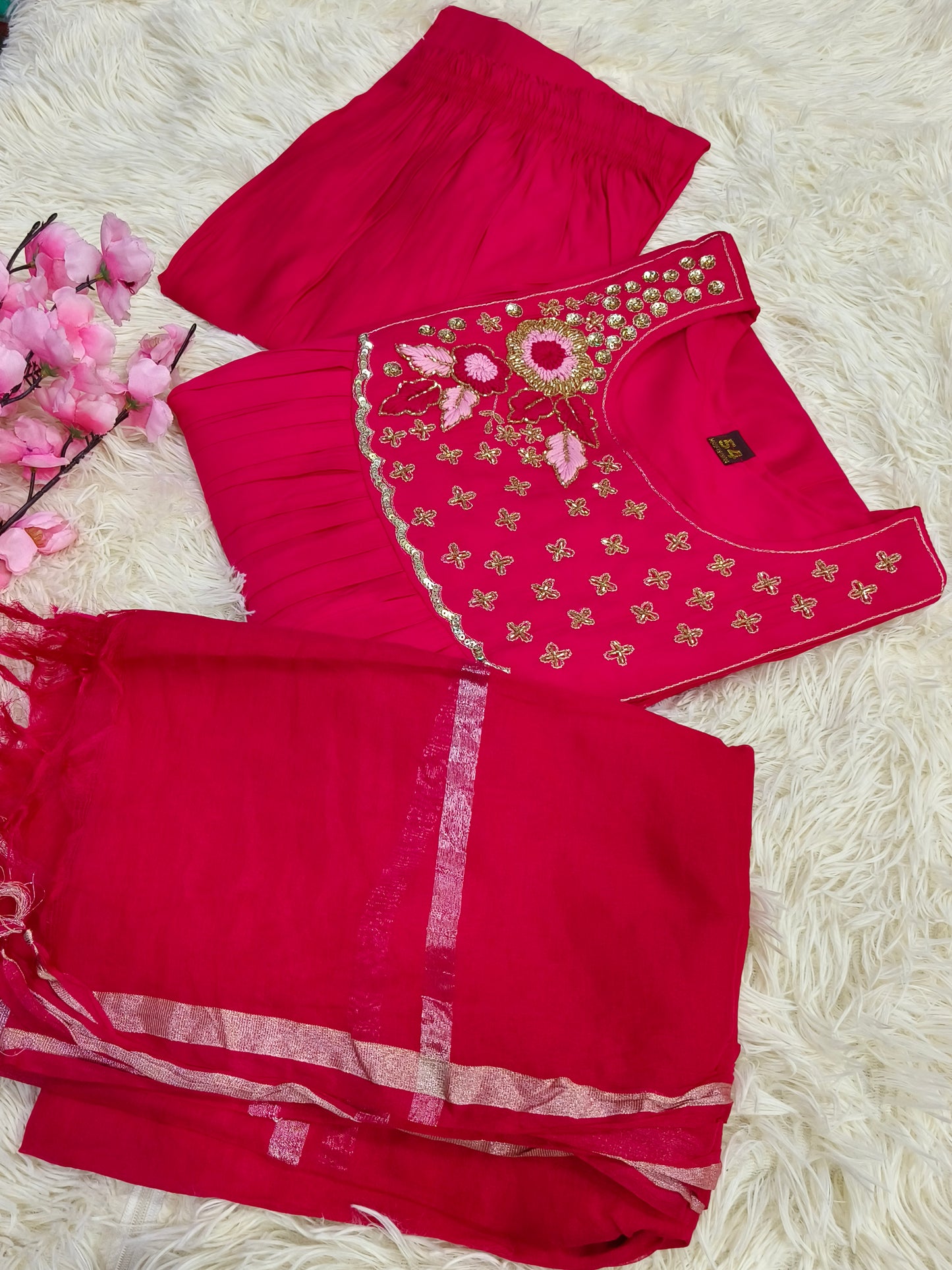 Pink designer suit