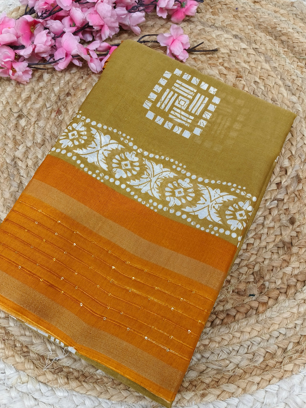 Light yellow with orange sequence saree