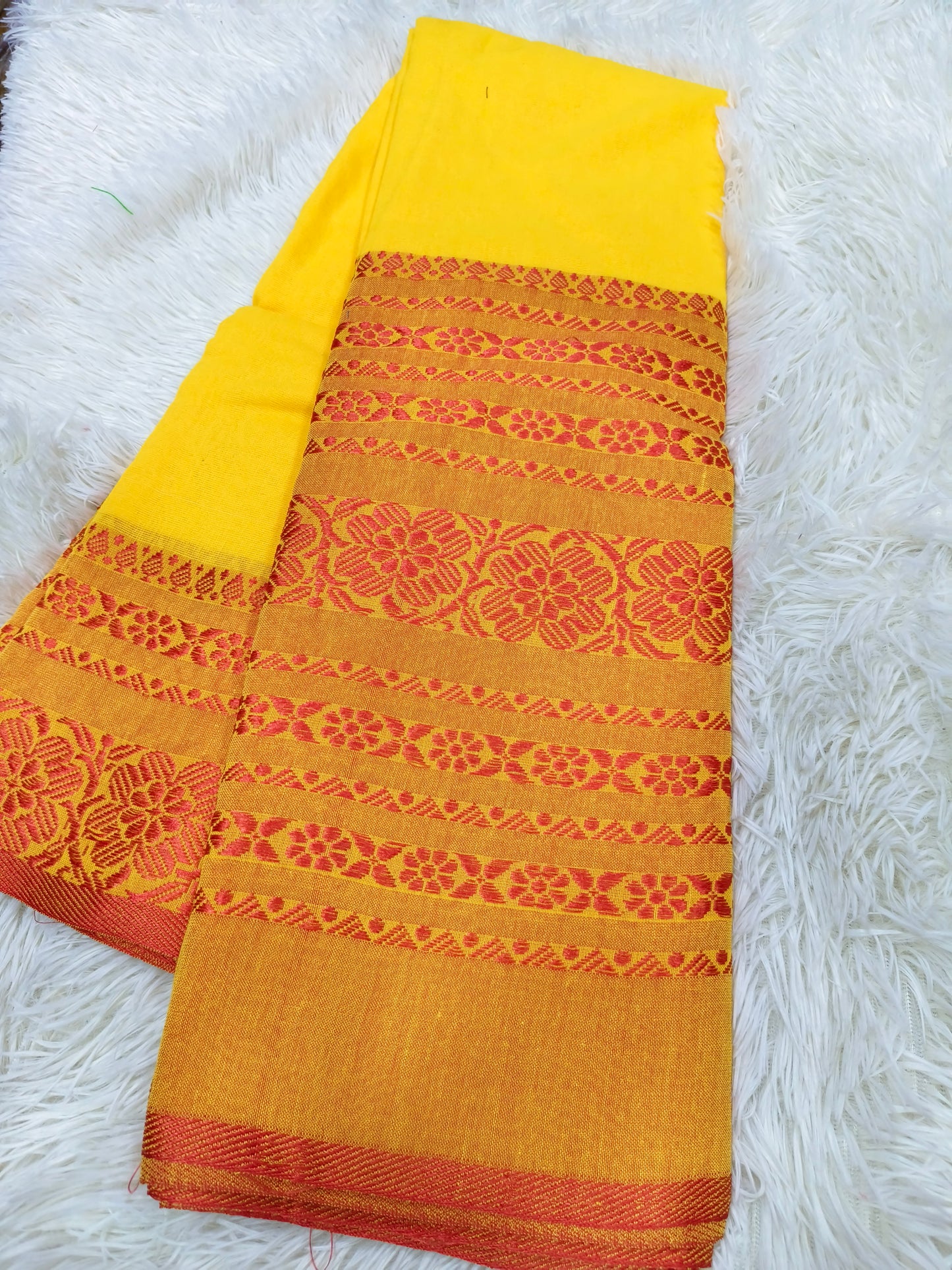 Yellow with rustic orange Khadi cotton saree