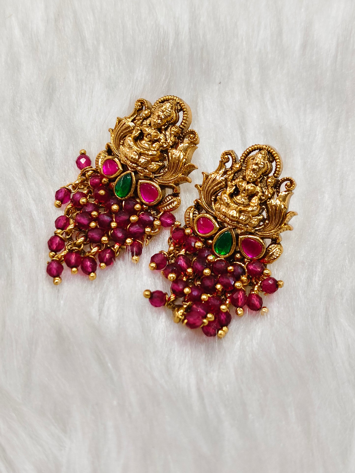 Ruby stone Lakshmi gold plated stud