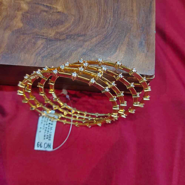 GOLD PLATED BANGLE WITH WHITE STONE