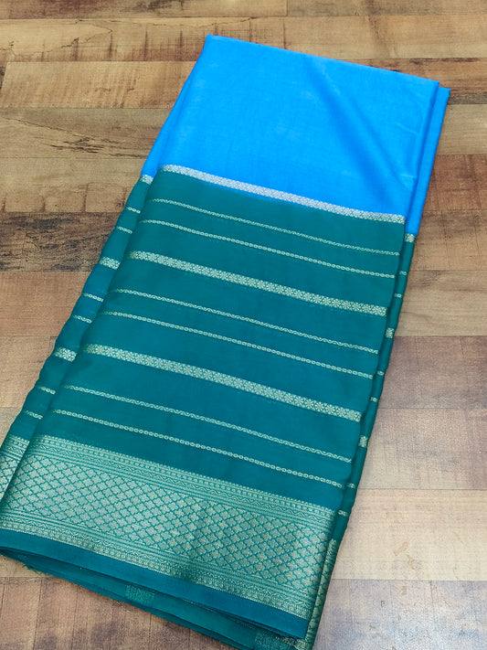 Aqua blue with green crepe silk saree