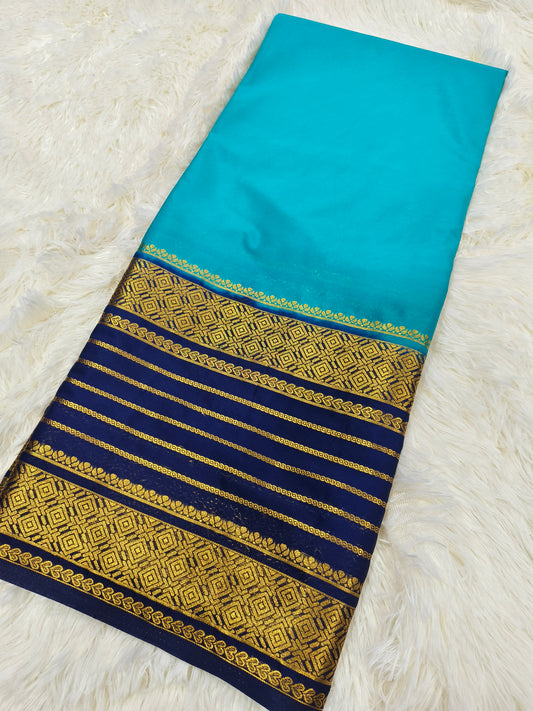 Aqua blue with navy crepe silk saree