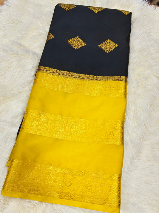 Black with yellow crepe silk saree