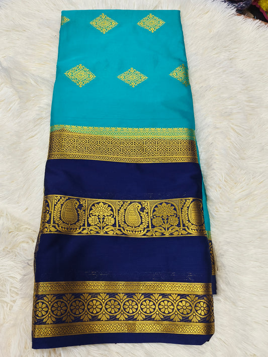 Aqua blue with navy blue crepe silk saree