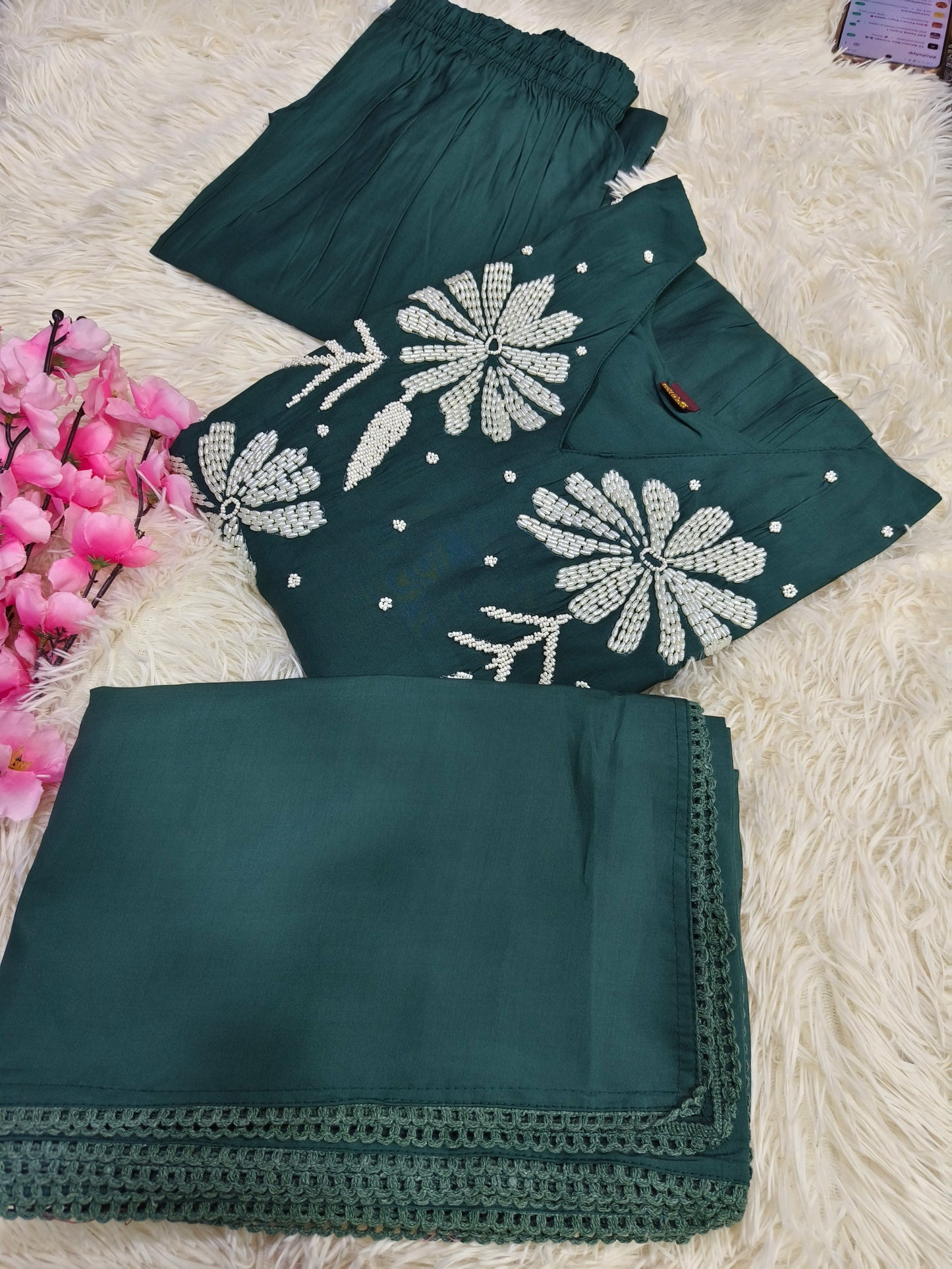 Green designer Aline suit