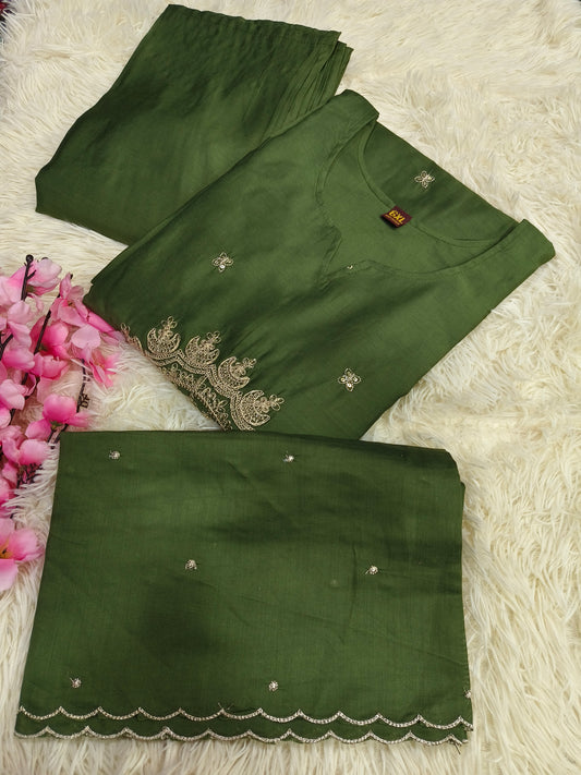 Green designer suit