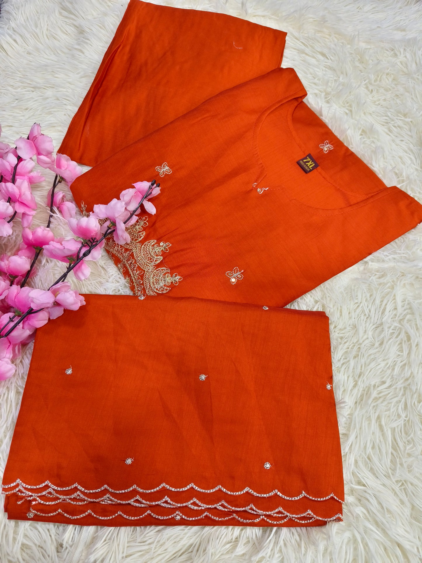 Orange designer suit