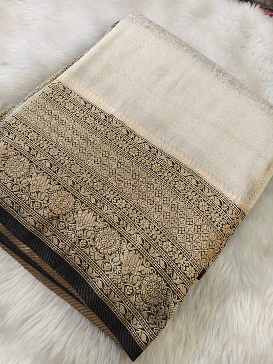 Grayish white brocade semi silk saree