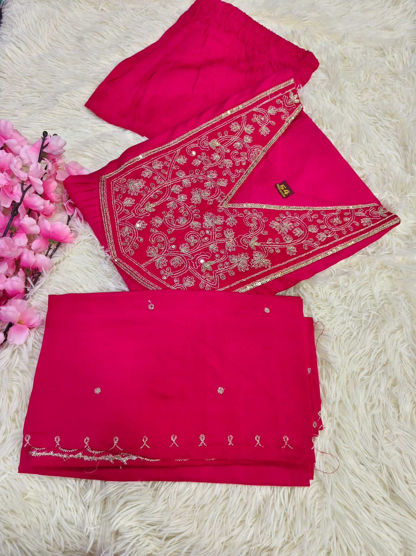 Pink designer suit