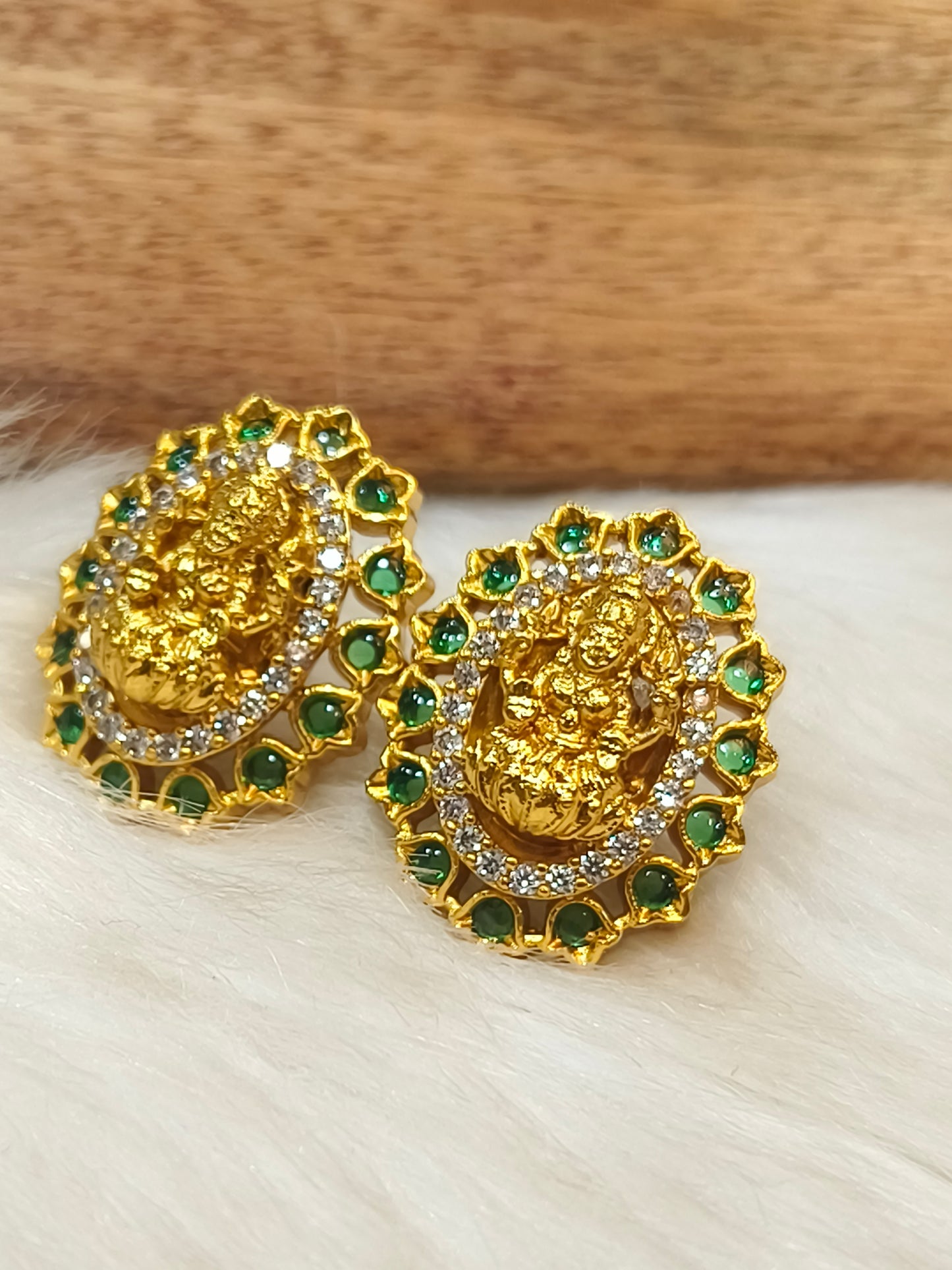 Green stone Lakshmi gold plated stud