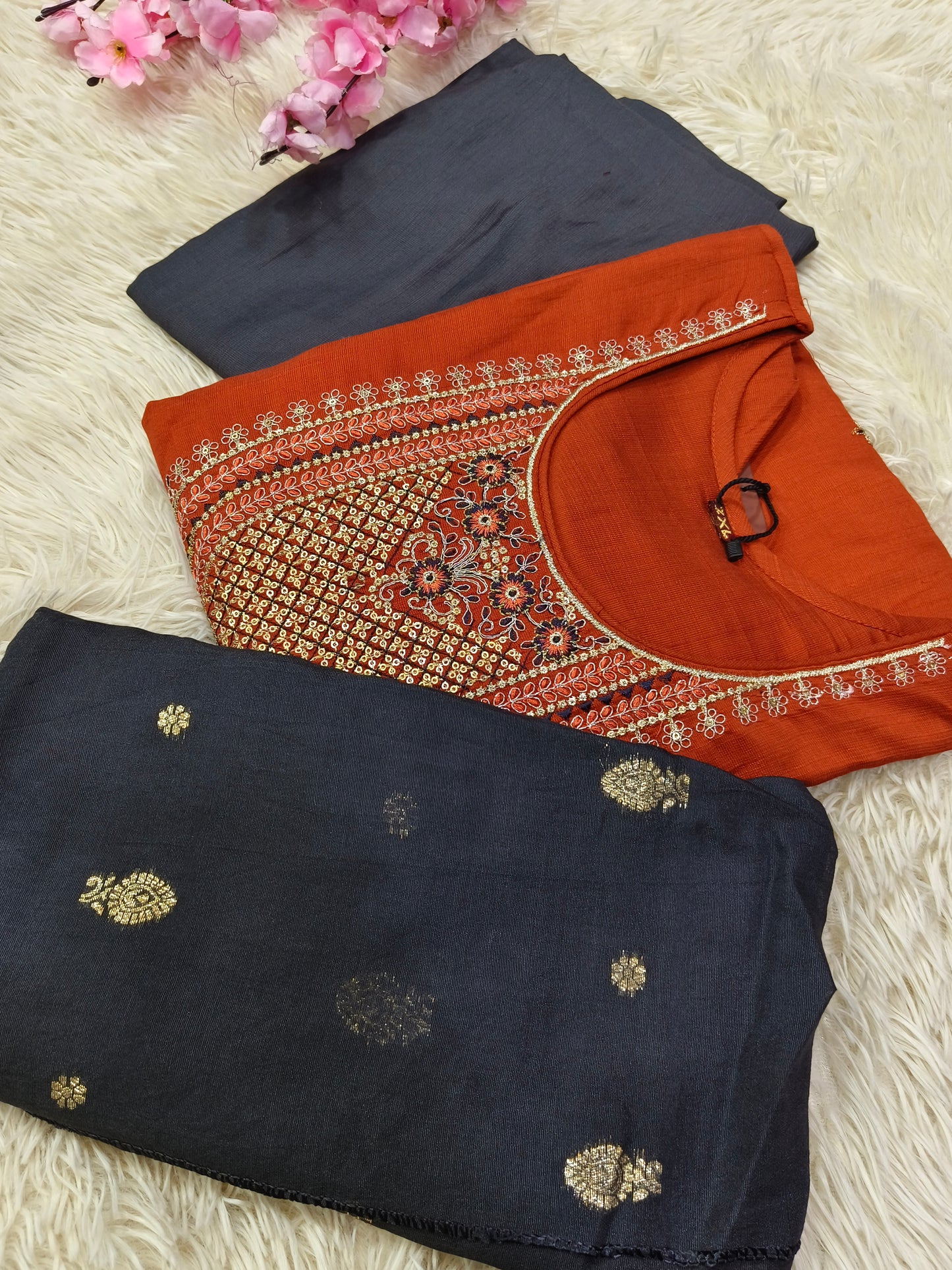 Rustic orange with Grey Eelgent designer suits