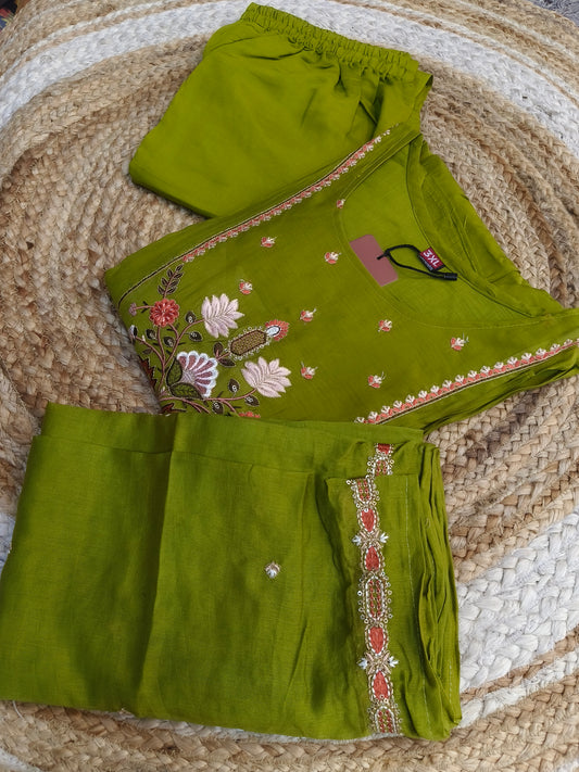 Green designer Aline suit