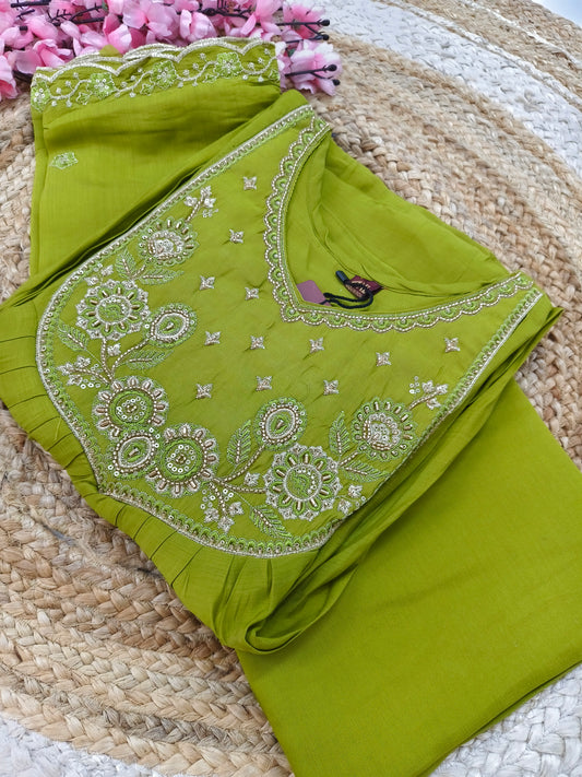 Green designer Aline suit