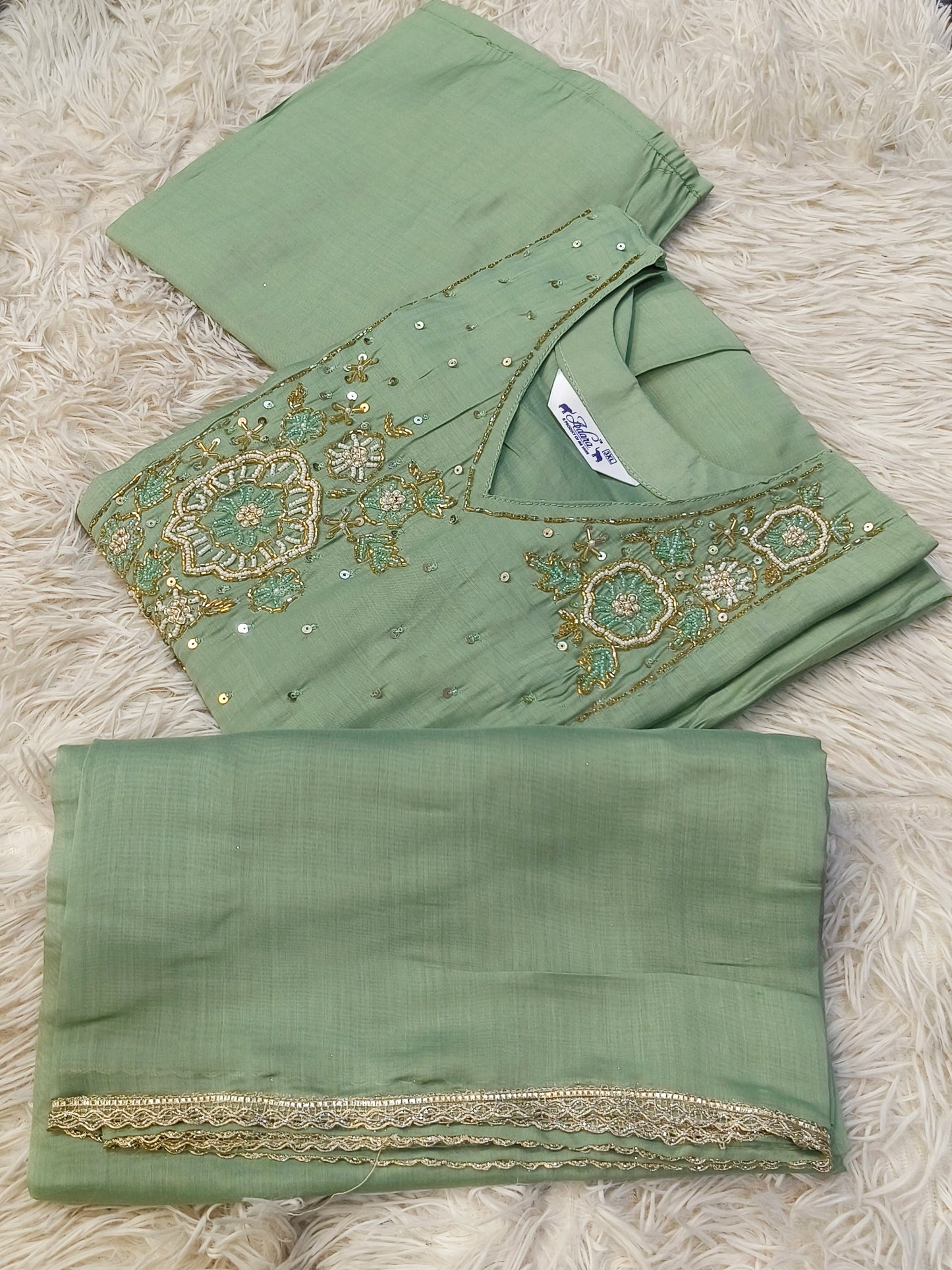 Pista Green designer Aline suit