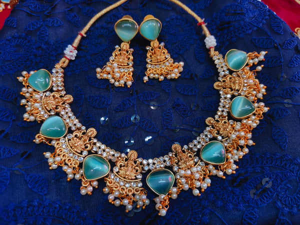 Matt Lakshmi necklace with blue stones and pearls