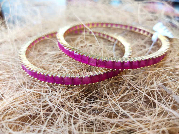 GOLD PLATED BANGLE WITH RUBY STONE